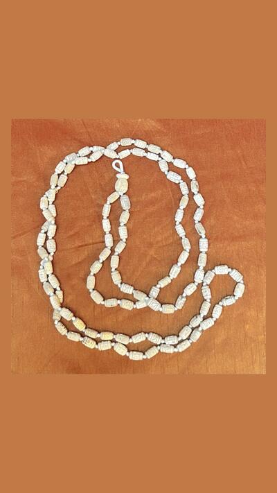 Small carved japa beads, neem