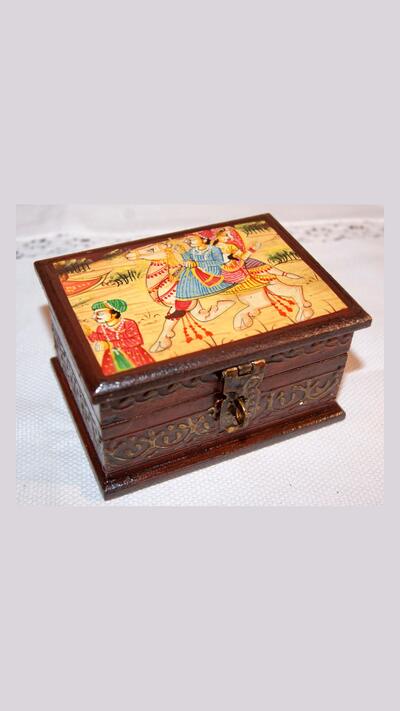 Painted box featuring a camel and people, 10 x 5.5 x 7.5 cm