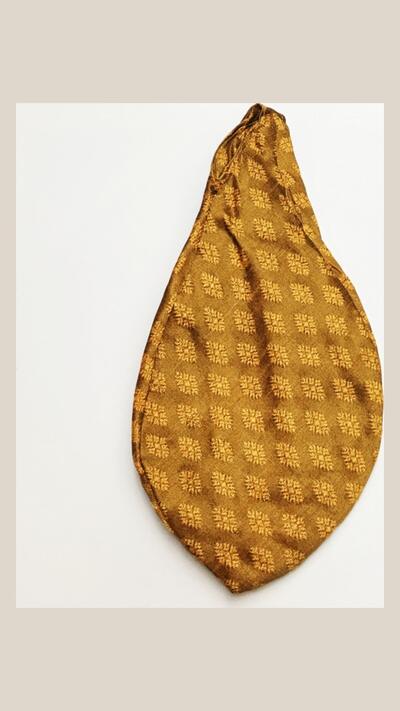 Women’s golden japa pouch