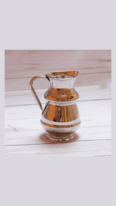 A kettle with a hinged lid