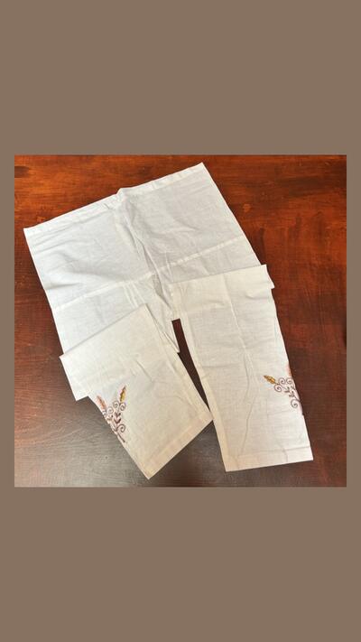 Men’s white bhakta trousers with a drawstring waist