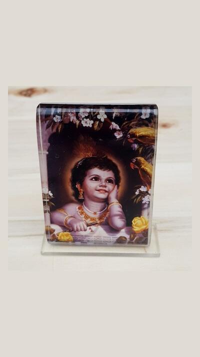 Krishna in a window, 7 x 5 cm