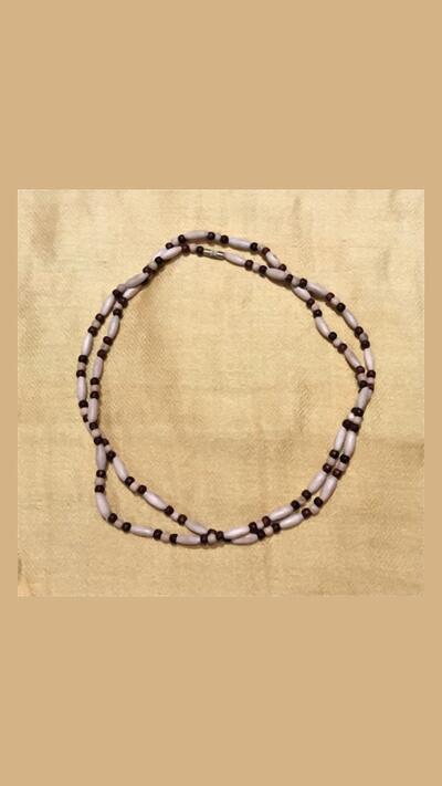 Kantimála, 2nd series, brown, between oval tulasi motifs