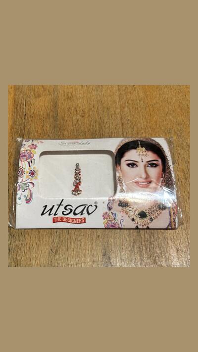 Red 2.5 cm bindi with eyelets