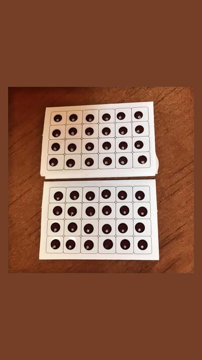 Bindi, size 4, dark red with a gemstone