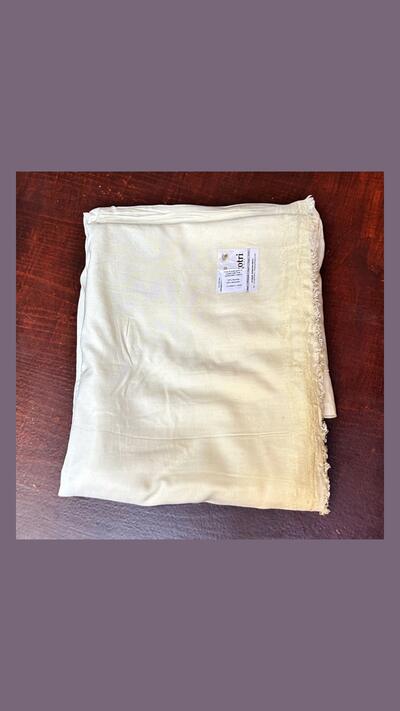 50% cream-coloured silk dhotis
