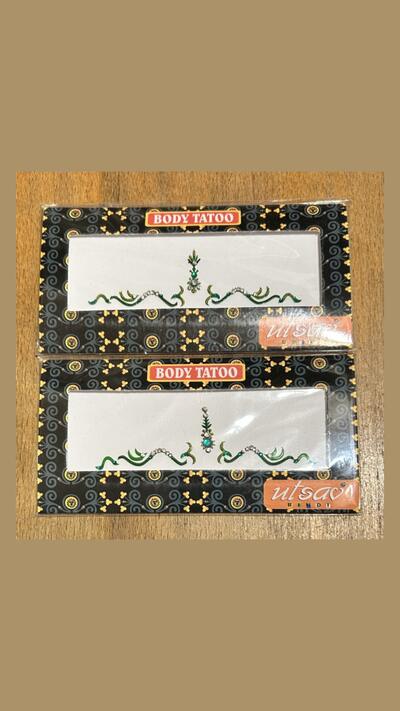 Green stick-on tattoos
