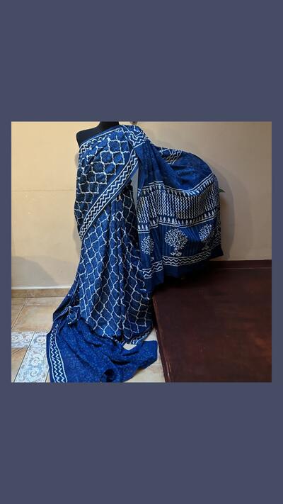 Dark blue and white cotton sari with a choli
