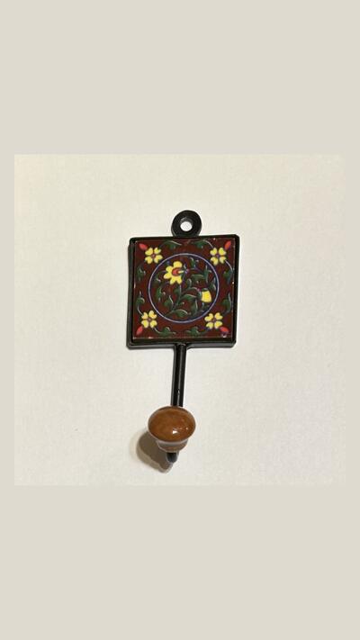 Square wall hook with a ceramic tip