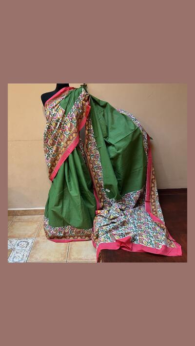 Green, red and yellow cotton sari with a choli top