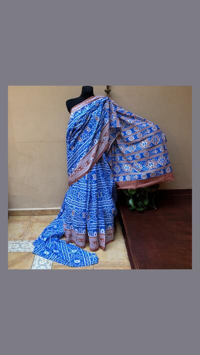Hand-printed cotton sari in blue, white and orange, with a piece of fabric for the choli