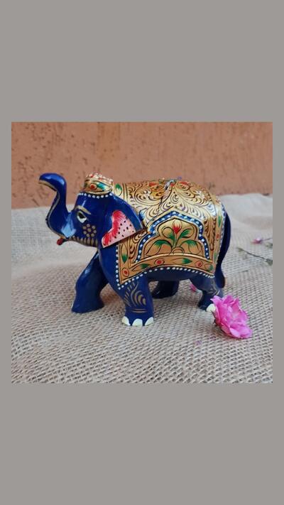 Painted wooden elephant, 11 x 13 cm