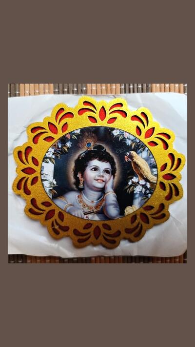 Wooden Krishna sticker in the window