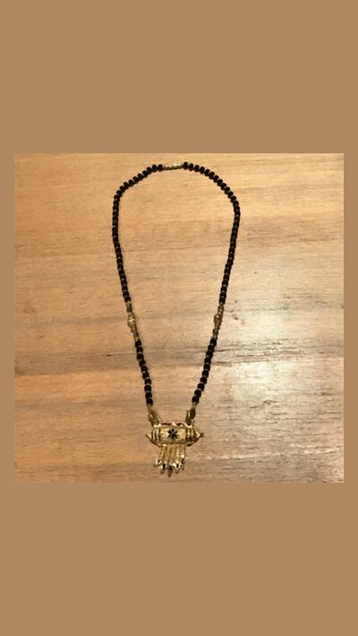 Black necklace with a clasp