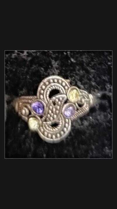 Oriental metal ring with coloured stones 1