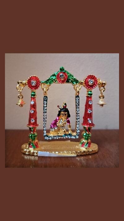 Little Krishna made of gilded metal