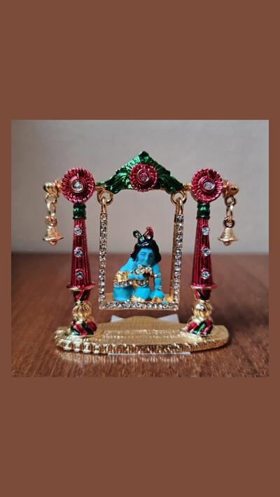 Little Krishna made of gilded metal
