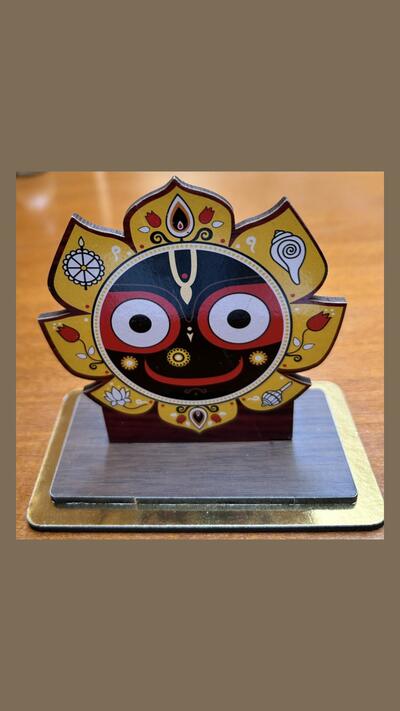 Wooden statue of Jagannath on a pedestal