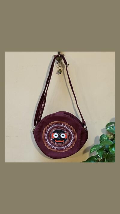Round burgundy shoulder bag, diameter 28 cm