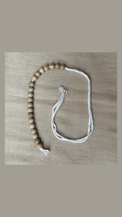 Bead counter for a bag of neem beads