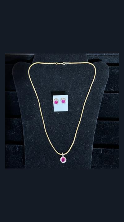 Vrinda Creation Necklace with a red stone and earrings