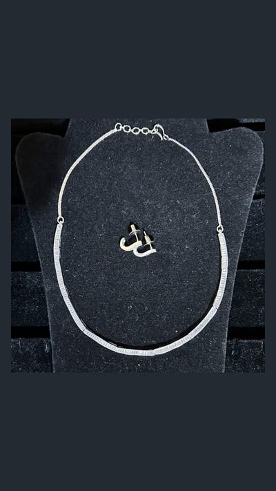 Vrinda Creation: Shaped silver necklace and earrings