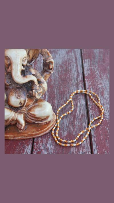 Kantimála, 2nd series, orange pairs of beads