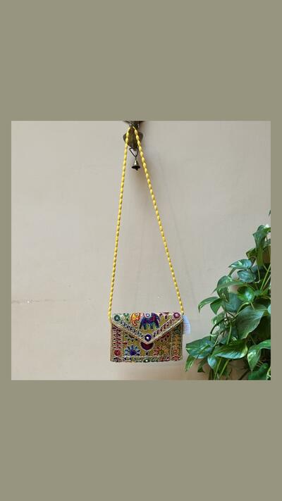 Embroidered clutch bag