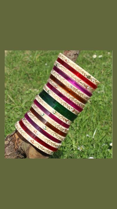 Set of 20 painted bracelets with rhinestones