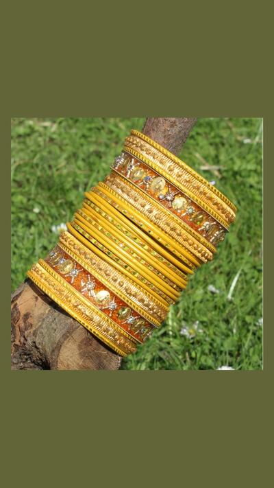 Set of 24 yellow bracelets